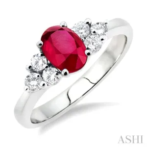 7x5mm Oval Cut Ruby and 1/3 Ctw Round Cut Diamond Ring in 14K White Gold