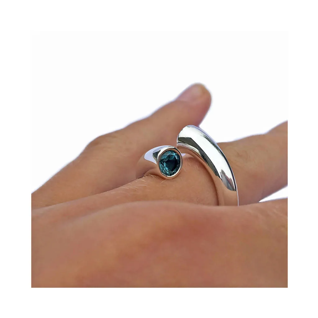 Double taper silver wiggly ring with blue topaz