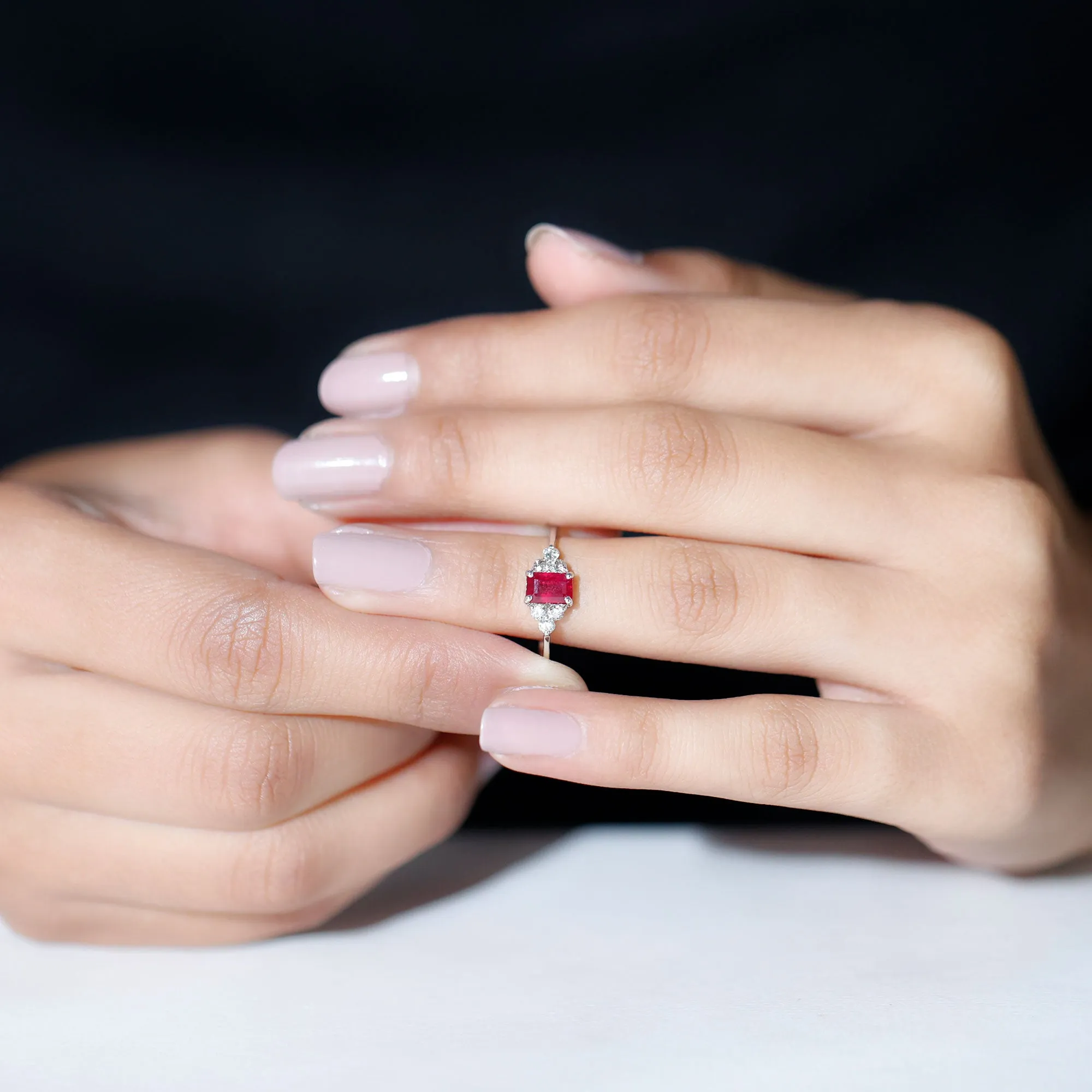 Emerald Cut Ruby Solitaire Ring with Diamond Trio