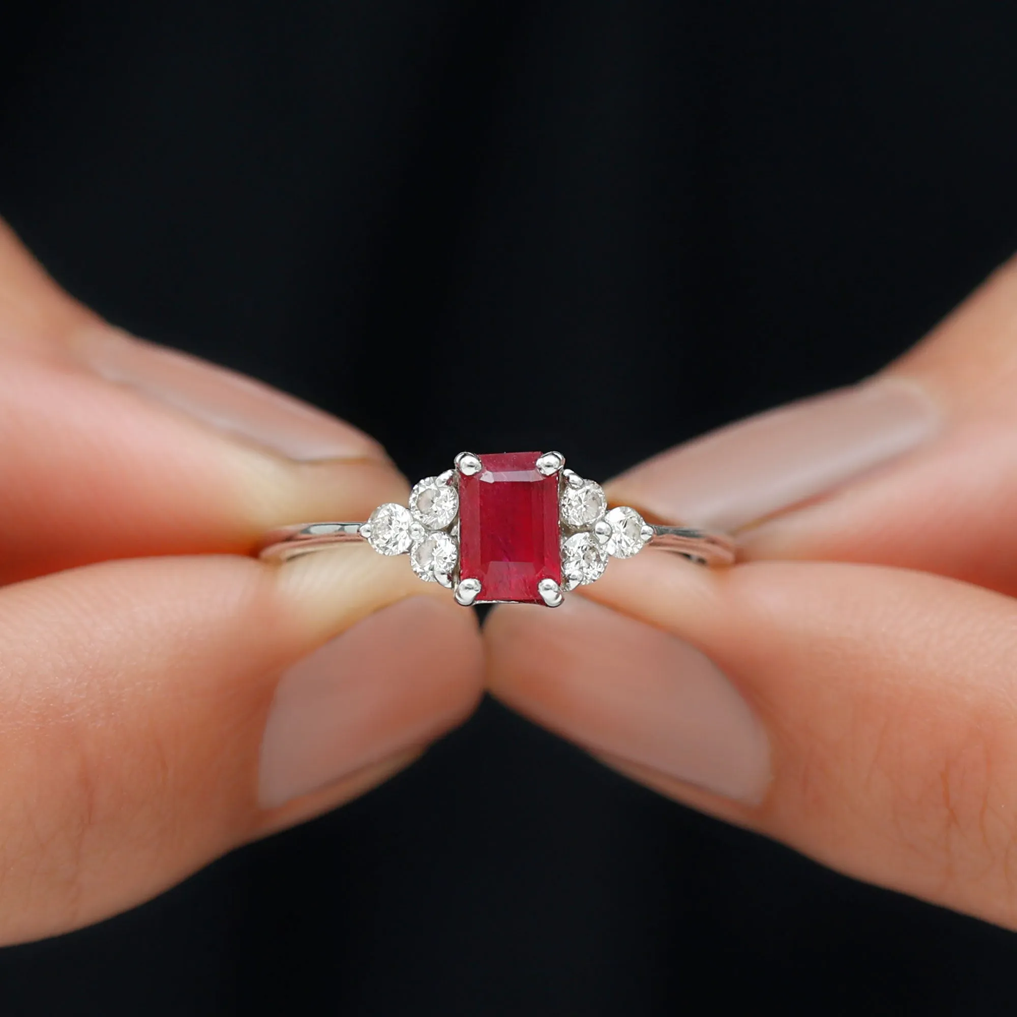 Emerald Cut Ruby Solitaire Ring with Diamond Trio