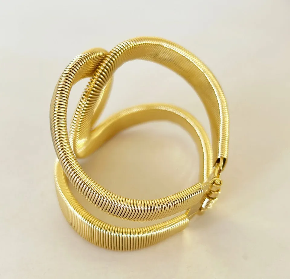 Gold double c style hinged designer statement bracelet