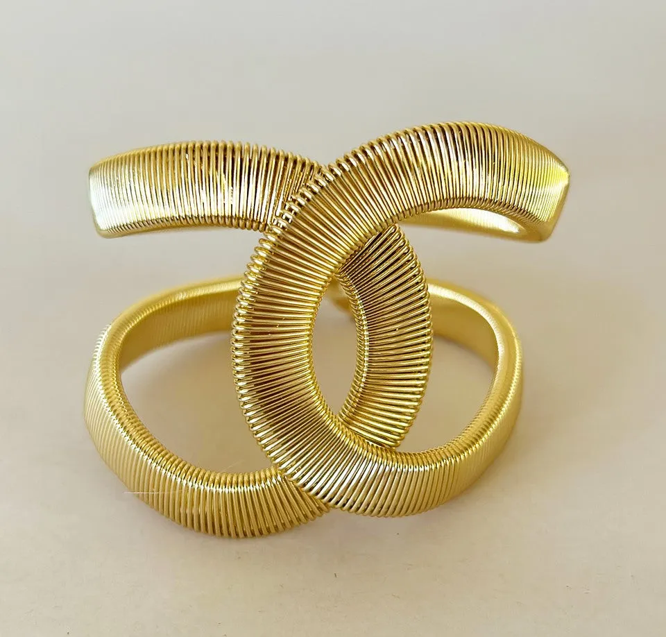 Gold double c style hinged designer statement bracelet