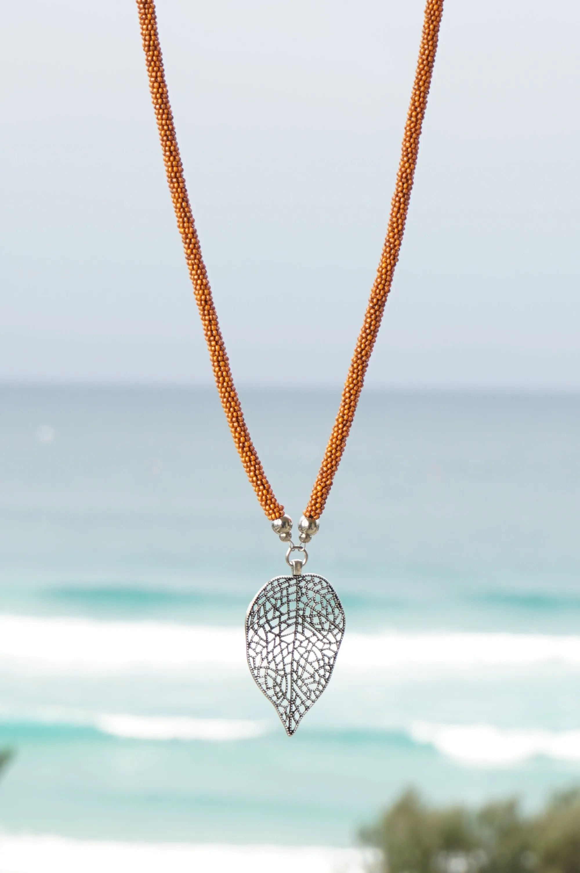 Orange Beaded Leaf Pendant Necklace