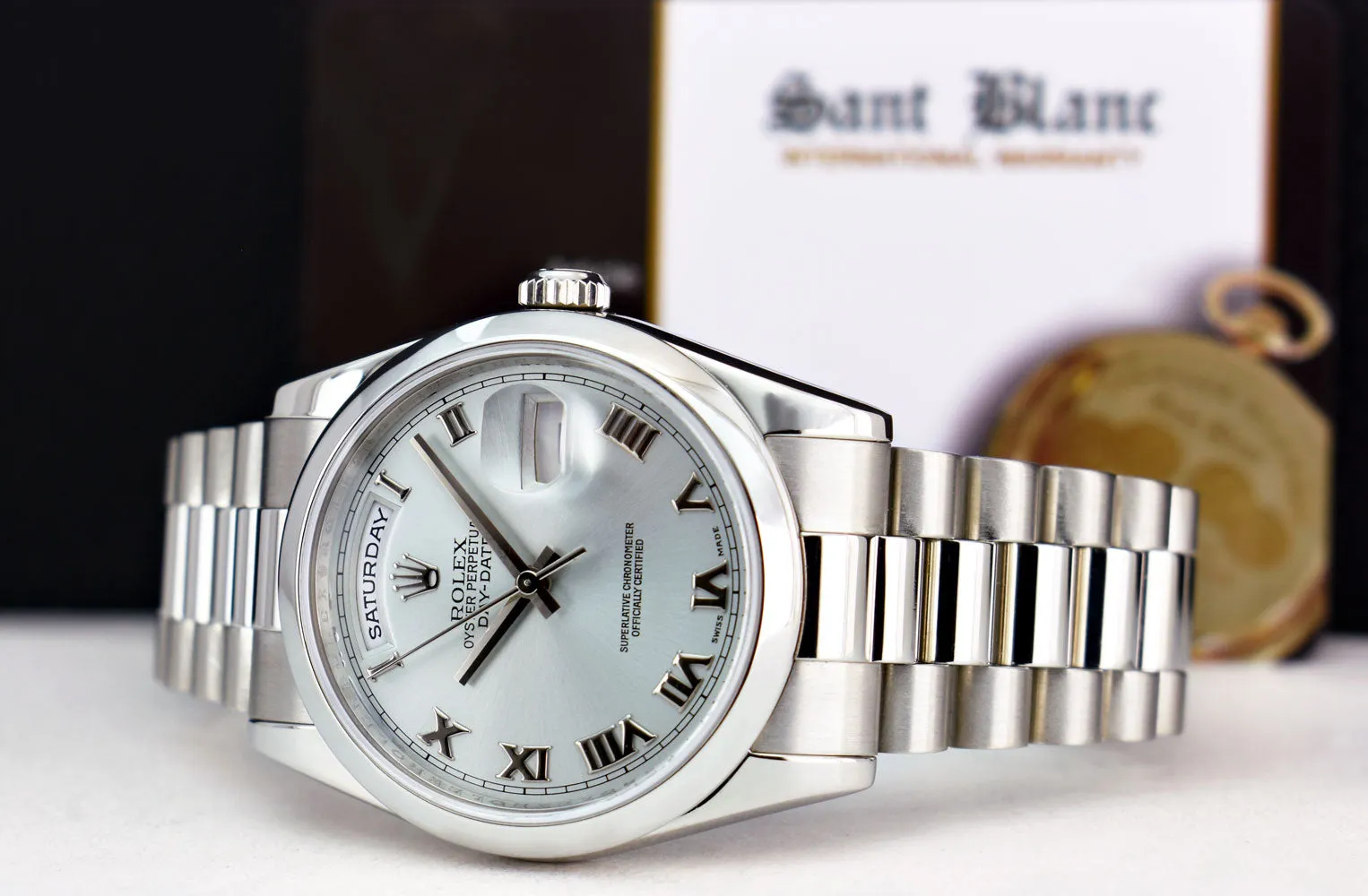 ROLEX REHAUT Mens Platinum President Day Date Bold Roman Dial Model 118206